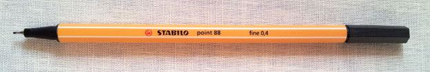 a Stabilo point 88 ink pen in a fine point