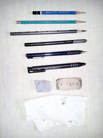 A Variety of pencils and erasers for sketching