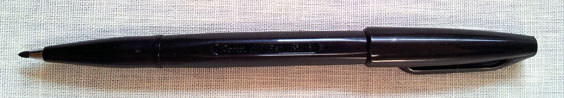 A Pentel Sign pen, black ink